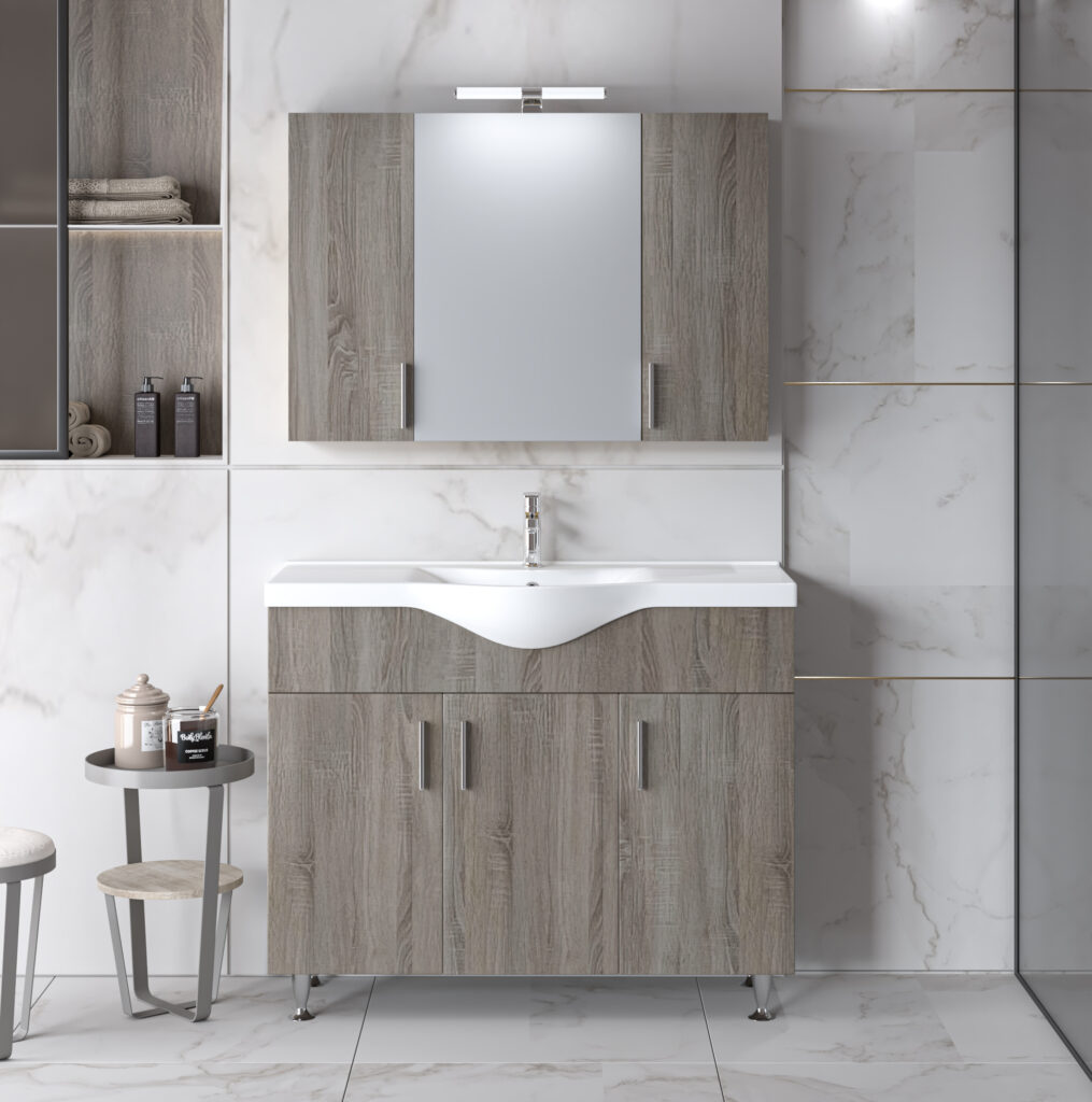 Το σετ SIENA SONOMA DARK 100 προσφέρει μοντέρνο design, νιπτήρα BASIC 100 και ευρύχωρα ντουλάπια για κομψό και οργανωμένο μπάνιο.